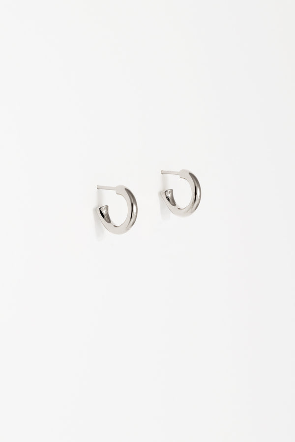 Also wearable as a plain small bold silver hoop with the pearl charm removed. 