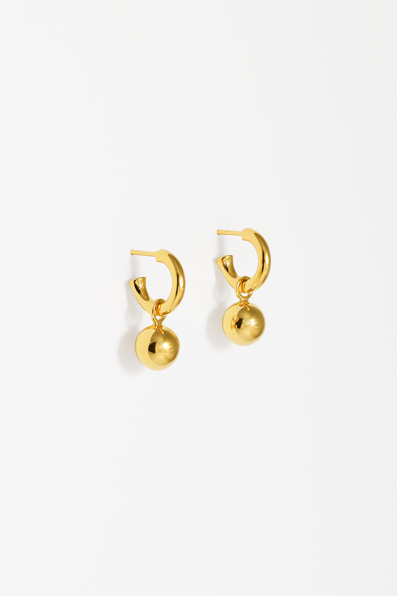 Small gold charm hoops with removable orb. 