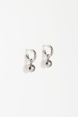 Small silver charm hoops with removable orb. 