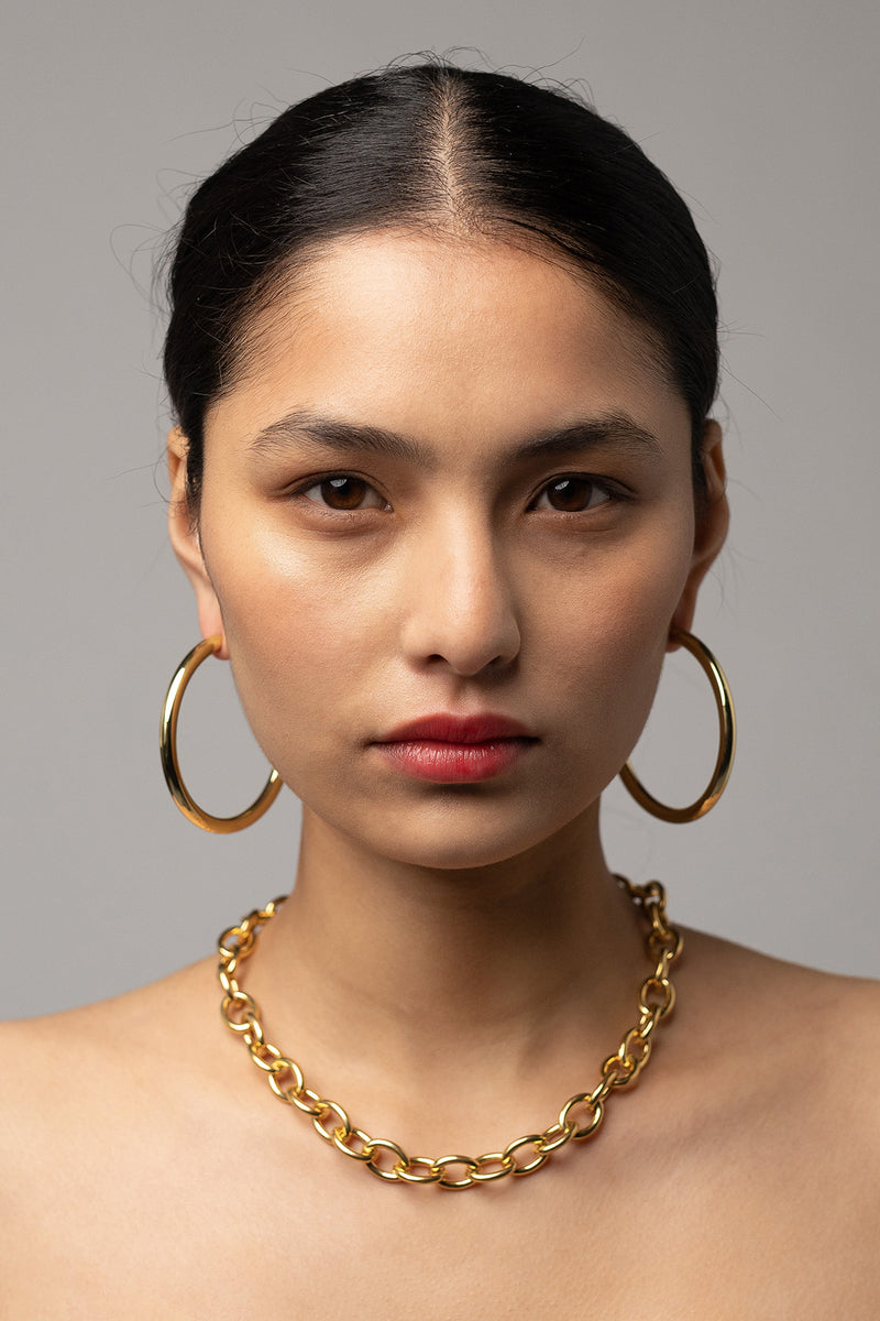 Forte Chain in Gold Plate, Worn on Bare Skin Front View