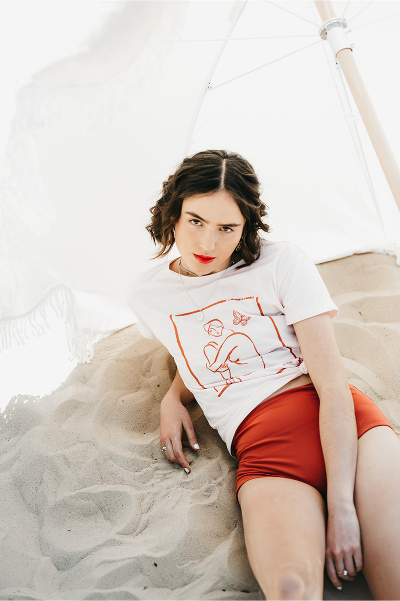 Art School T-Shirt, Baby Peach Organic Cotton, Worn View 1, by Naomi Murrell